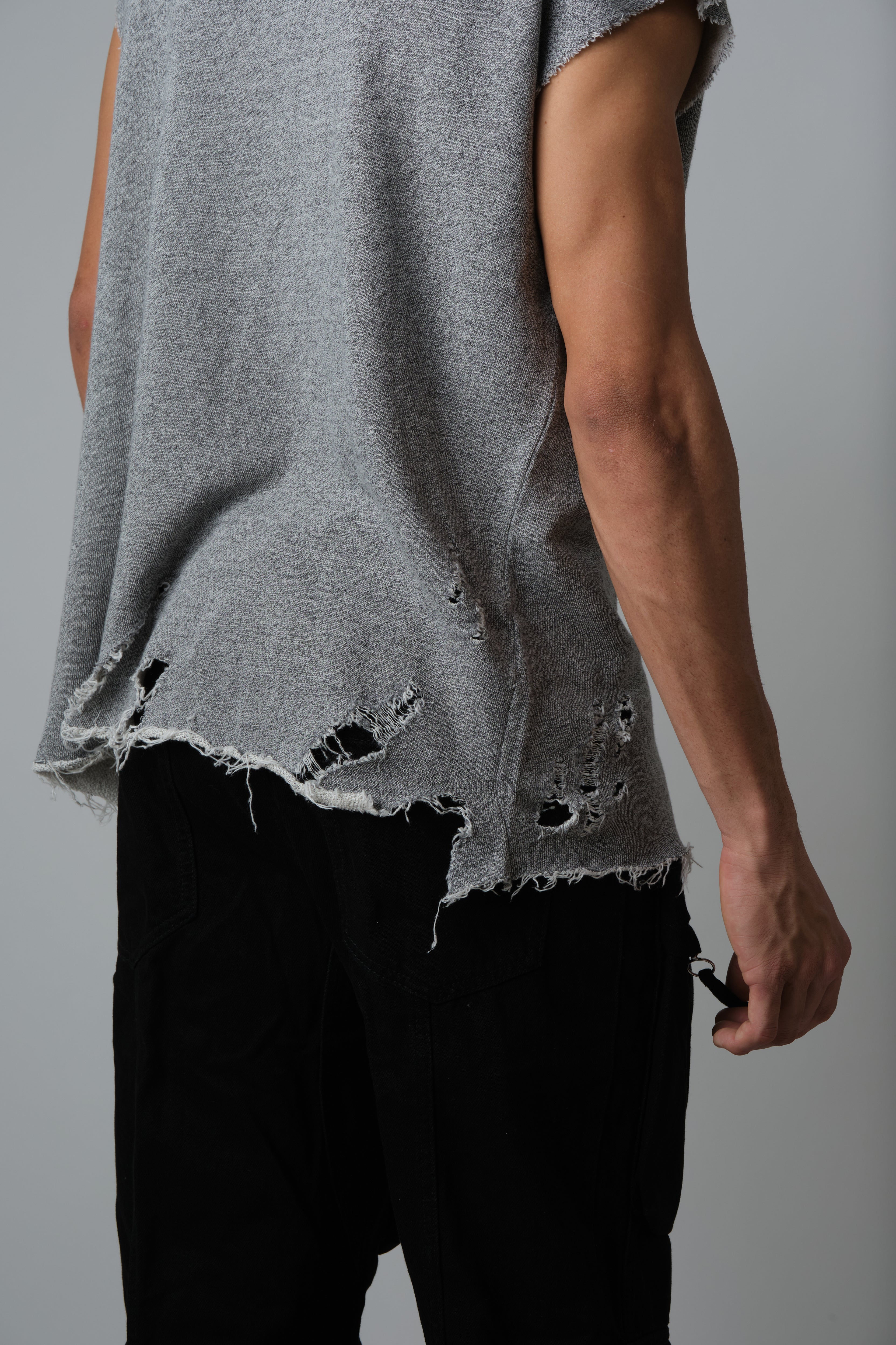 COW BOY T, FEATURING HEAVILY DISTRESSED EDGES