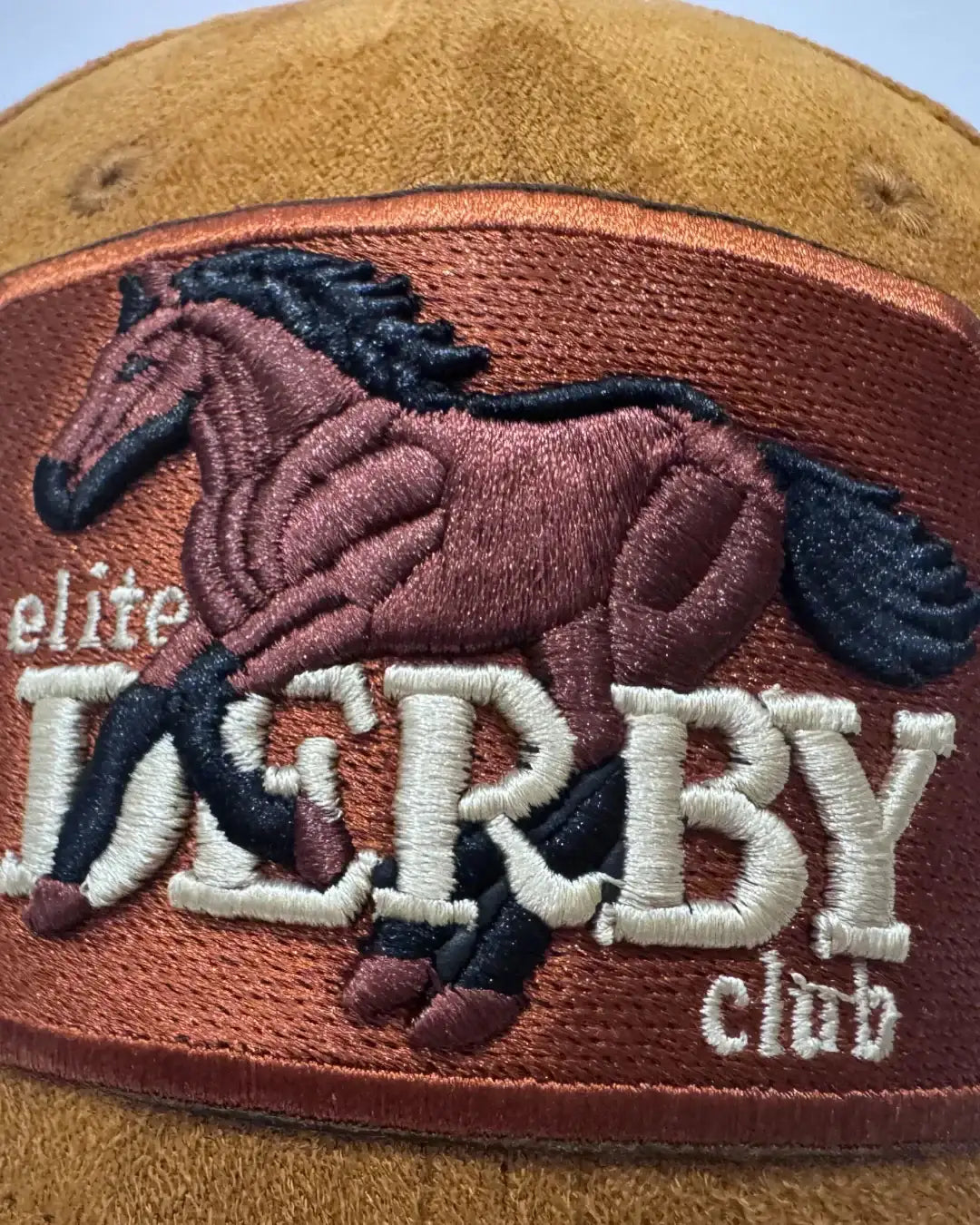 teeside brown cap with embroidered horse and derby club patch detail