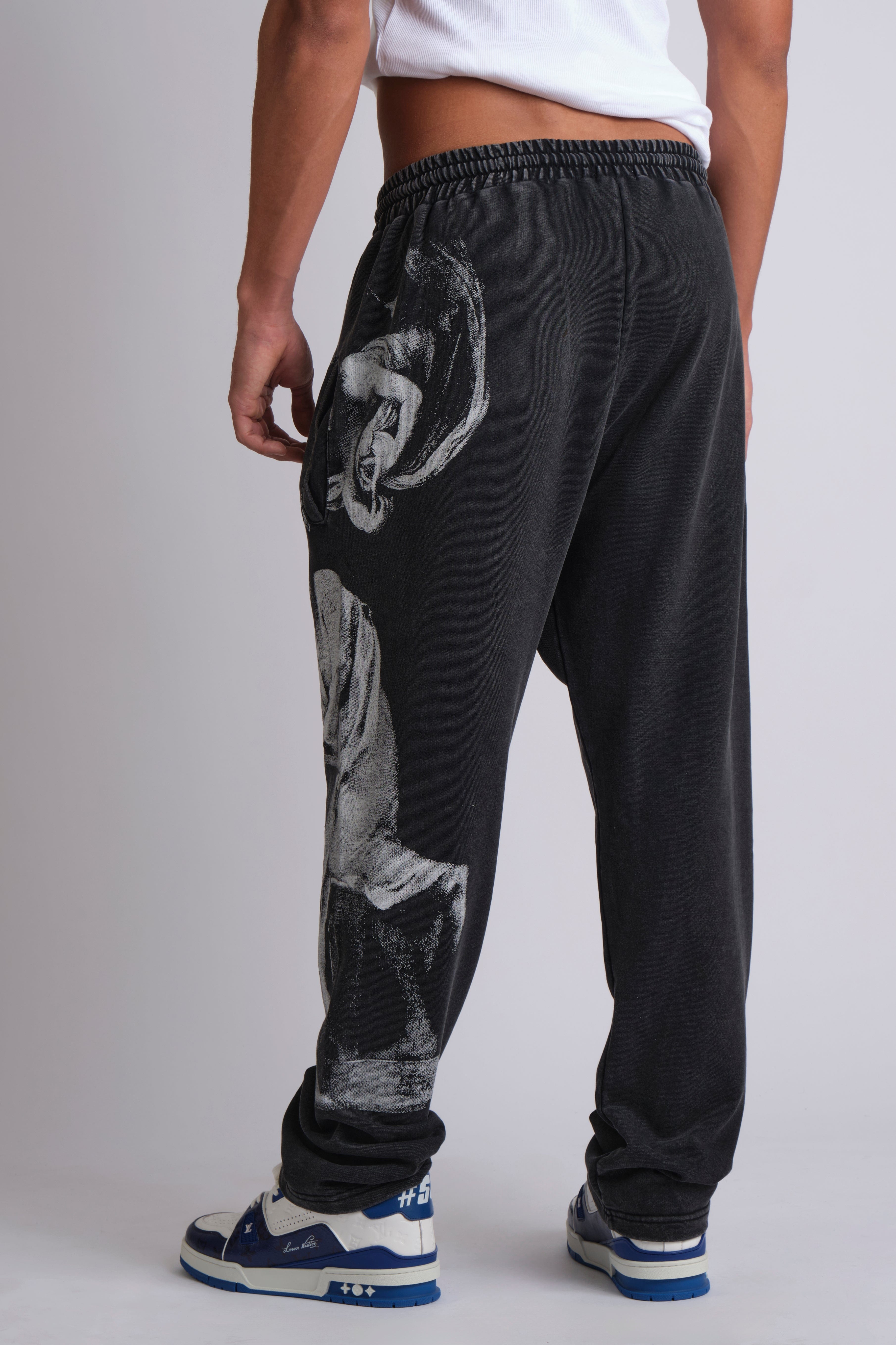 GRAPHIC-PRINT TRACK PANTS INSPIRED BY RENAISSANCE PAINTINGS